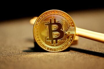 Un bitcoin en forma de moneda